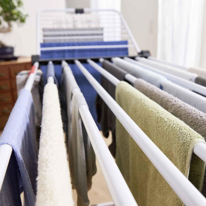 Corde à linge avec tiges télescopiques